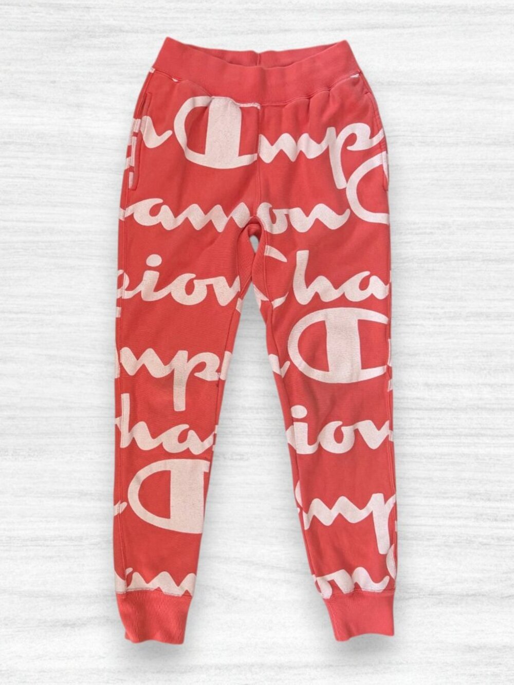 Champion Reverse Weave All Over Spellout Logo Jogger Sweatpants Coral Pink S